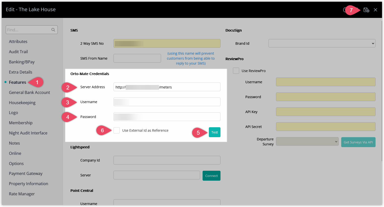 Screenshot of the Property Information edit window in RMS with the Features tab selected, showing fields for Orto‑Mate Server Address, Username and Password, a Test button to verify the connection, an optional Use External ID as Reference checkbox and a Save/Exit button.