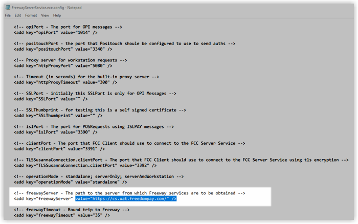 FreewayServerService.exe.config file open in Notepad, showing the freewayServer key value changed from cs.uat.freedompay.com to cs.freedompay.us.